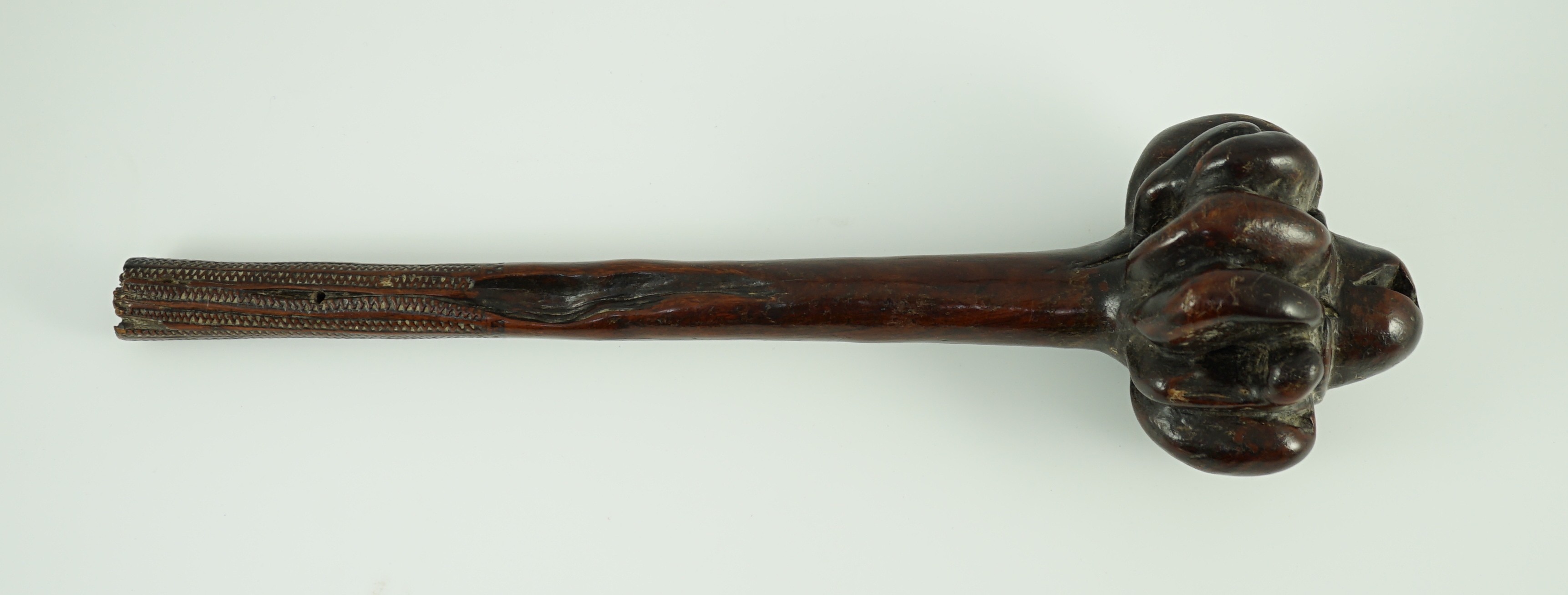 A Fijian hardwood throwing club, 40cm long